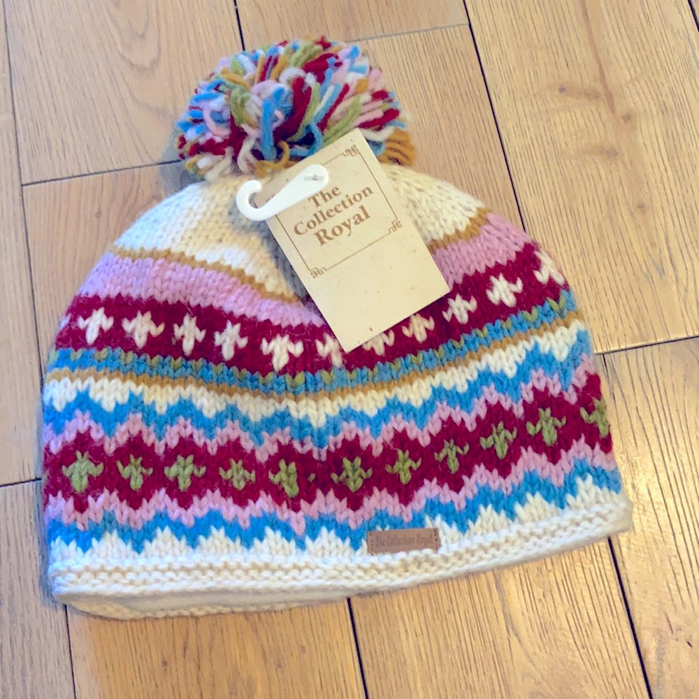 Wool handmade sock cap.  Fully lined with soft creme colored fabric.